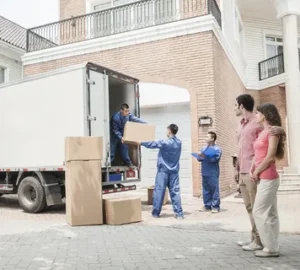 Villa movers unloading boxes from truck in Dubai