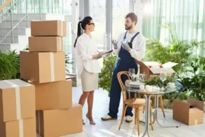 Professional villa movers packing household items in Dubai