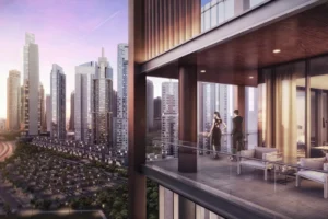 Luxury high-rise apartment balcony overlooking Downtown Dubai skyline at sunset